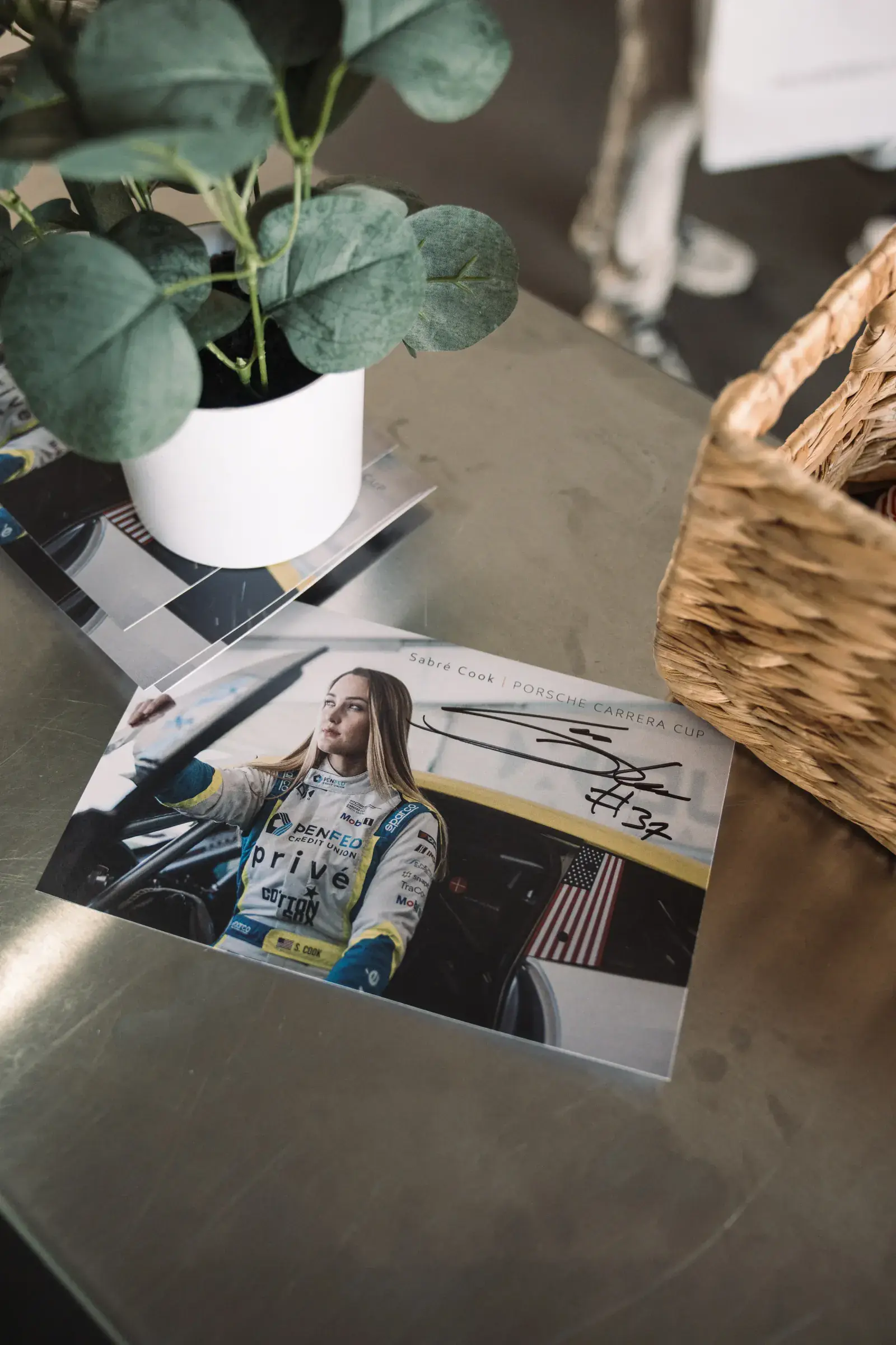 Sabré Cook card autographing at the Porsche Experience Center Atlanta 10th Anniversary event.