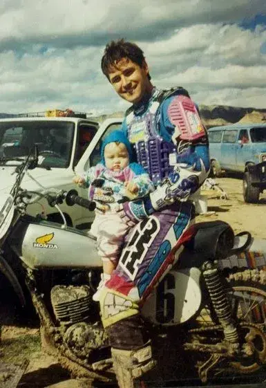 Young Sabré Cook with her father at a karting event in Colorado, where her racing journey began at age 8