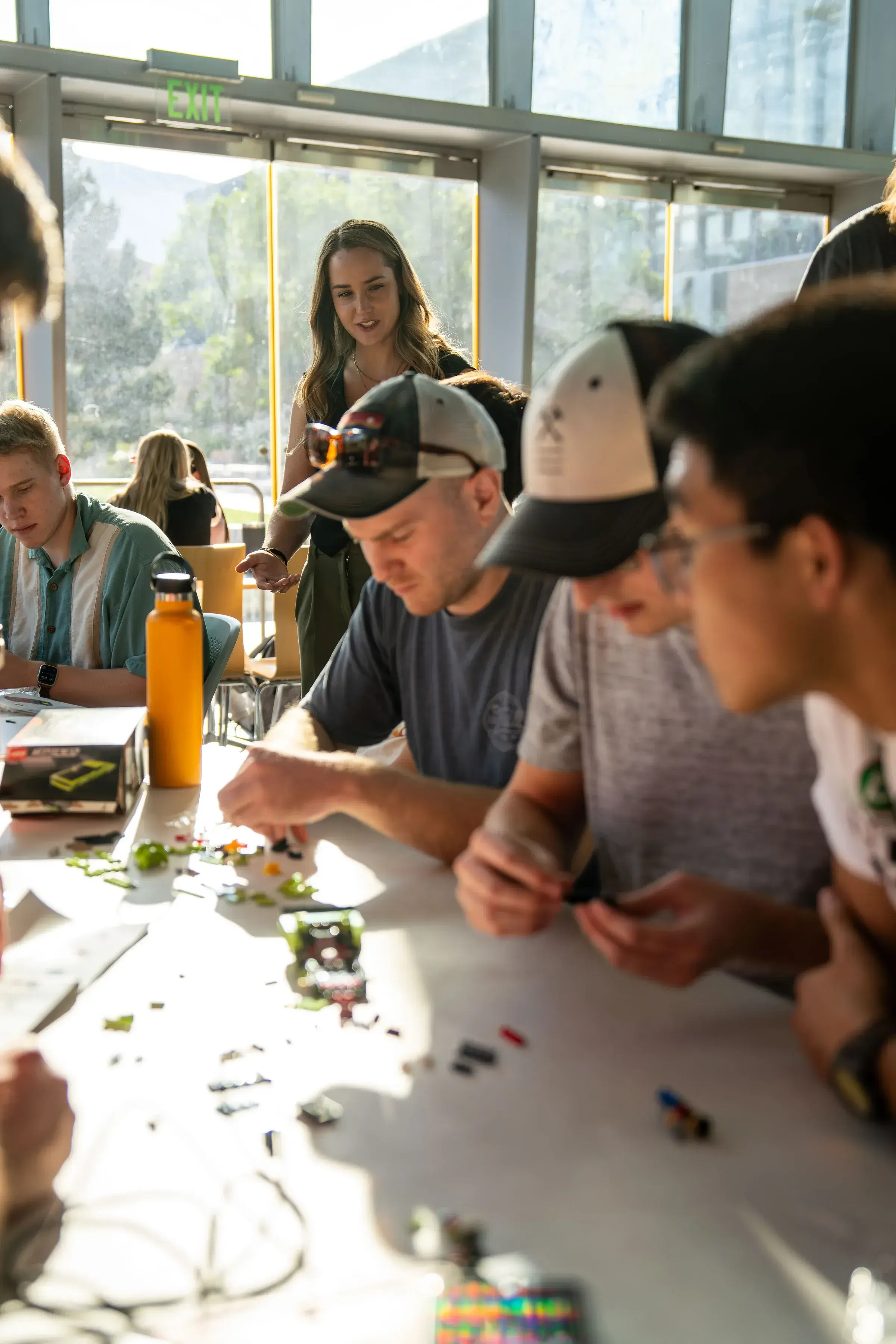 Sabré interacting with students during a STEM activity at the Colorado School of Mines.