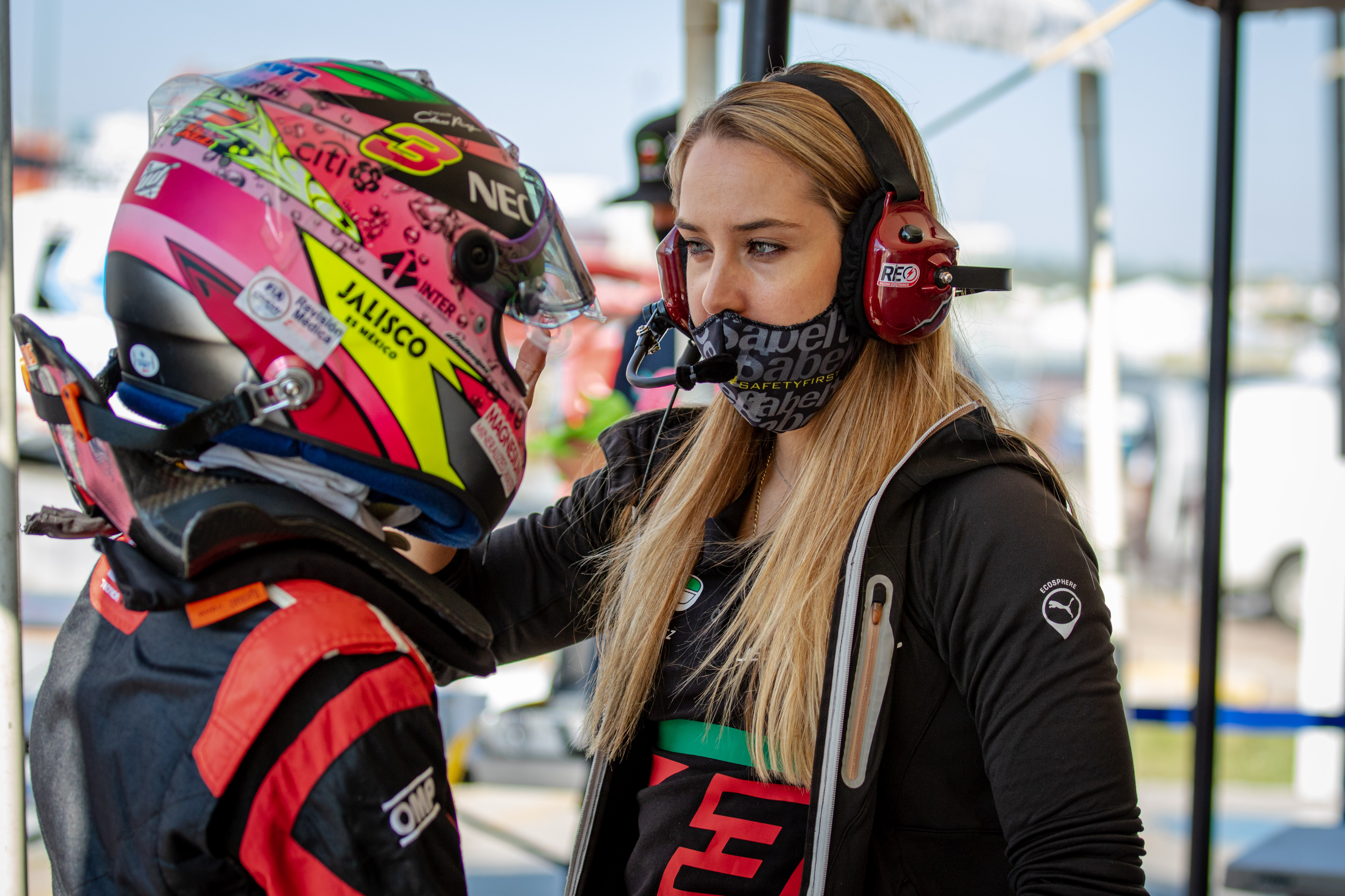 Sabré coaching fellow racer