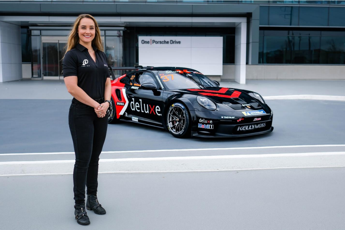 Sabré Standing Next To Her Porsche