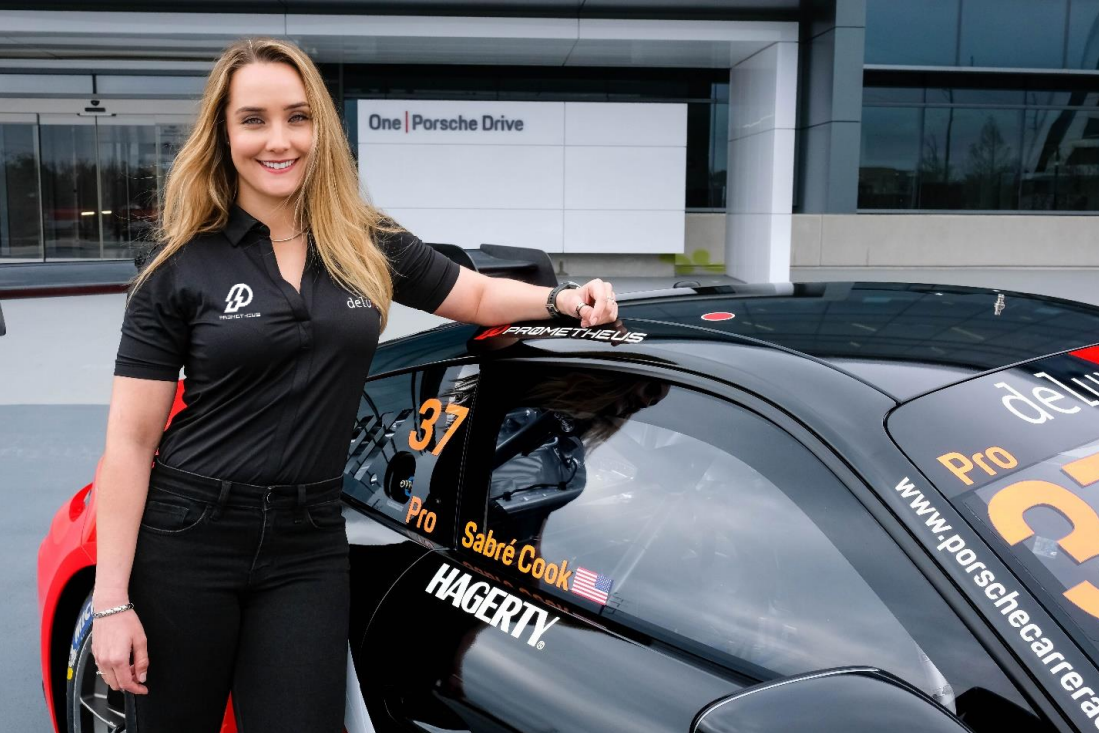 Sabré Standing Next To Her Porsche